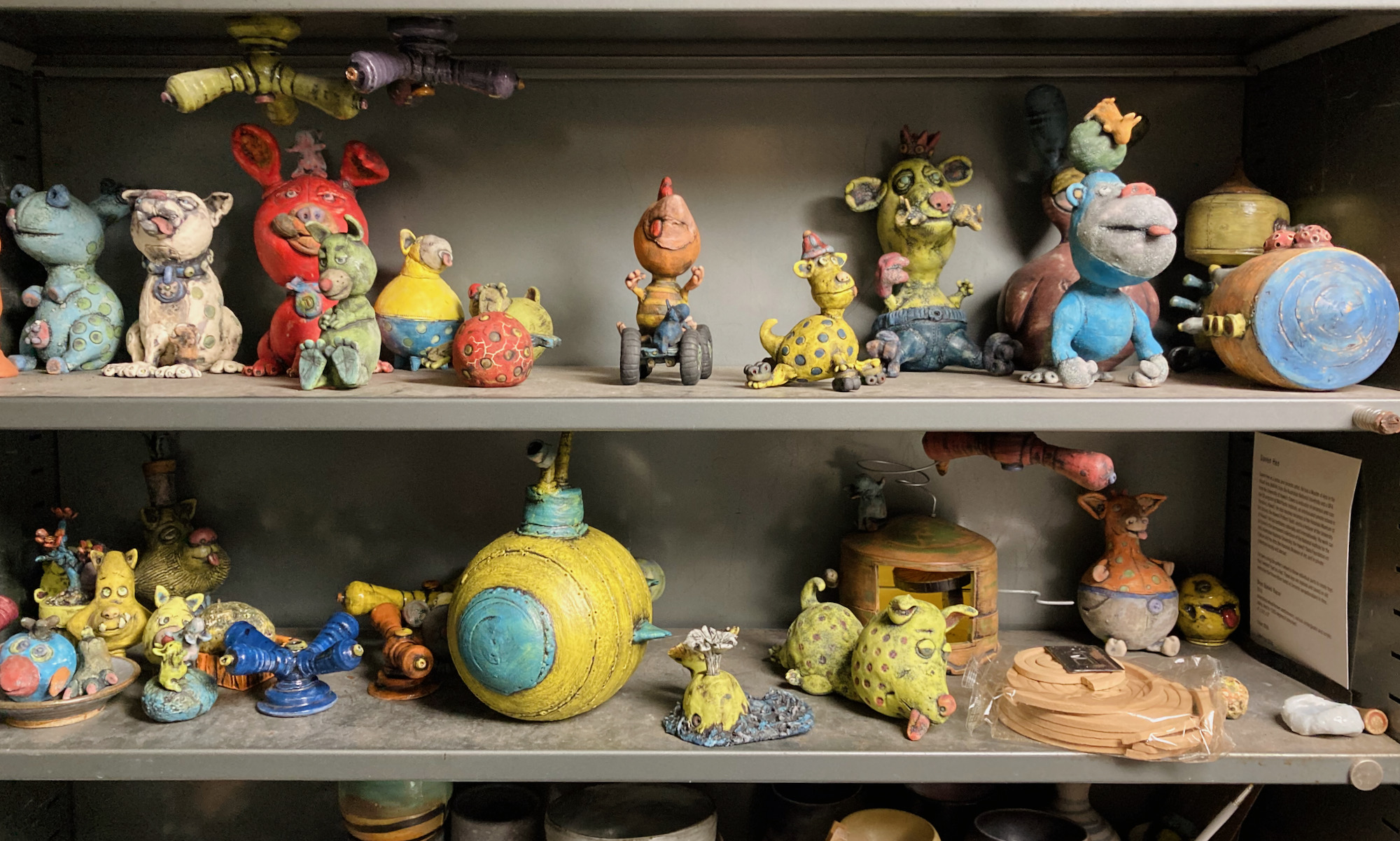shelves with handmade ceramic toys